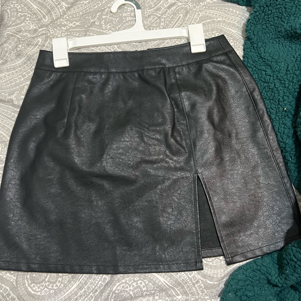 Black with crocodile pattern.